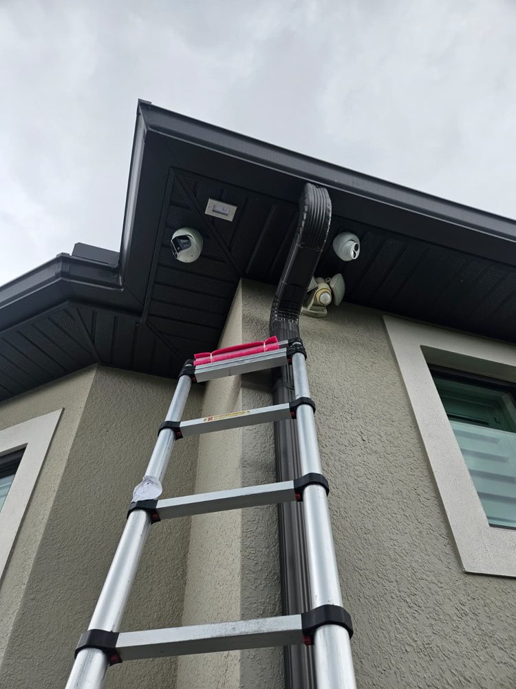 Eave-mounted camera, tidy install