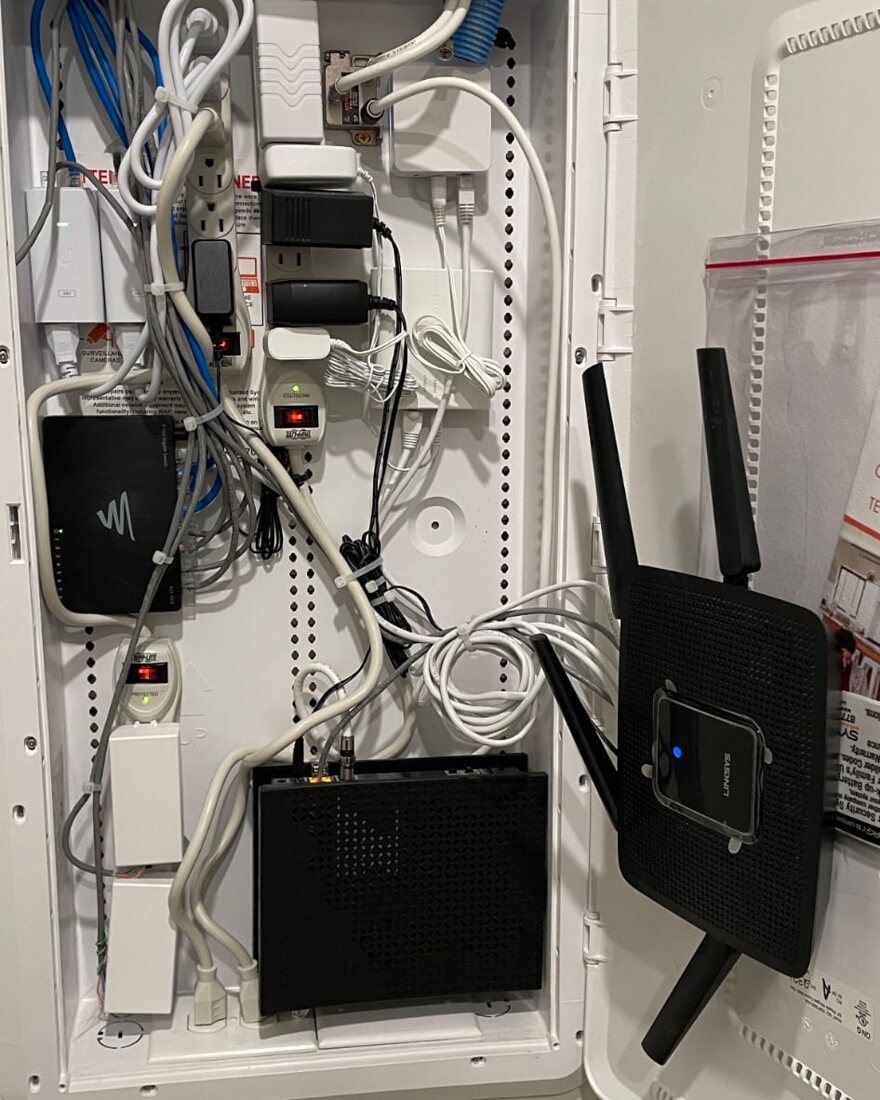 Neatly organized network rack with structured cabling and modern networking equipment